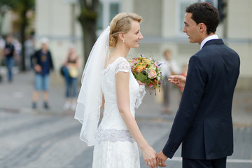 Bride and groom walking together