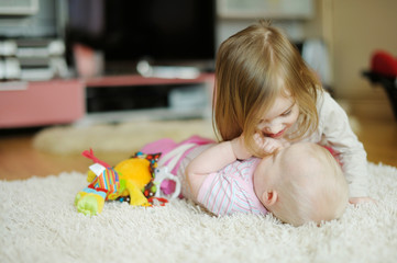 Two sisters playing together