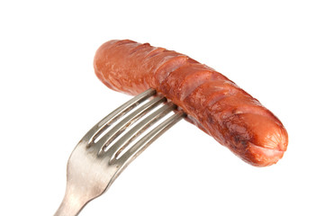 Grilled sausage on a fork