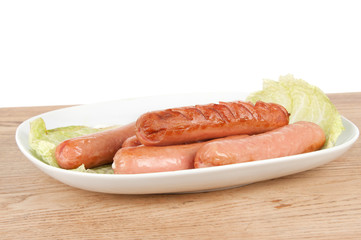 grilled sausages on a plate