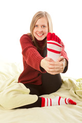 Girl holding her foot