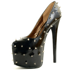 black patent concealed platform shoes with spikes, shot on white