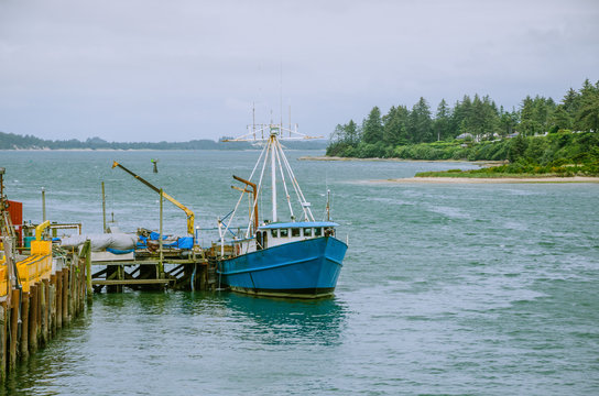 Fishing Boat at Dock Being Unloaded