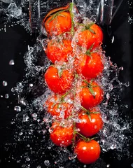  tomatentak in waterspatten.. © Konstantin Kulikov
