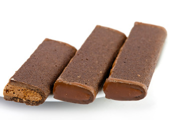 Chocolate sticks on a saucer- Japanese sweet.