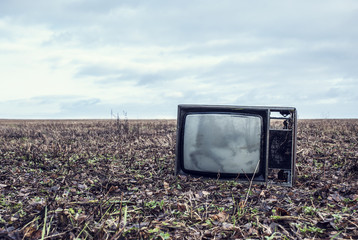 old TV is an autumn field
