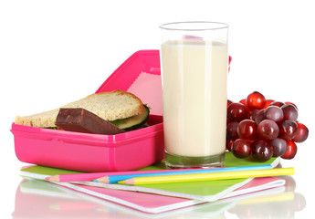 Lunch box with sandwich,milk,grapes and stationery isolated