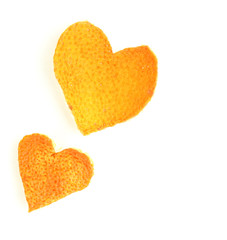 Decorative hearts from dry orange peel isolated on white