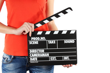 Movie production clapper board in hands isolated on white