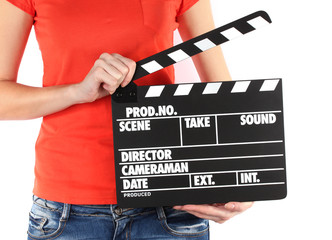 Movie production clapper board in hands isolated on white