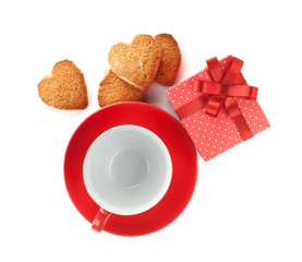 Red coffee cup and heart shaped cookies and gift box