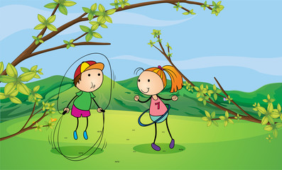 Obraz na płótnie Canvas Chłopiec i dziewczynka grając w górach