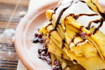 sweet pancakes with sour cream and sauce