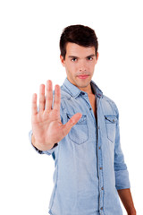 Beautiful man showing stop sign