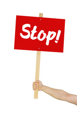 Person hält Schild mit der Aufschrift Stop