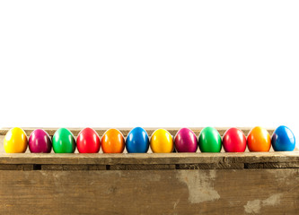 Colorful easter eggs on old wooden background.  Easter concept.