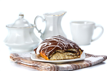 bun covered chocolate and glaze