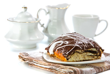 bun covered chocolate and glaze