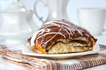 bun covered chocolate and glaze