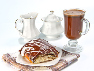 bun covered chocolate and glaze