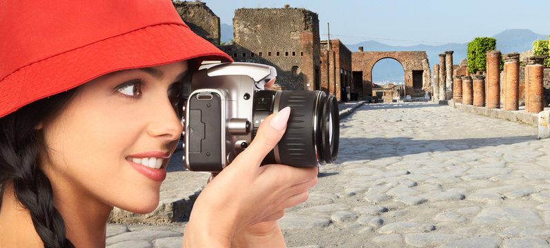 Tourist woman with a camera.