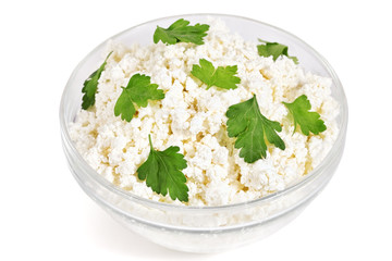 Fresh cottage cheese (curd) in glass bow, isolated on white back
