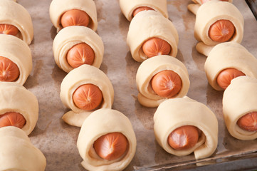Preparation for baking sausage in dough