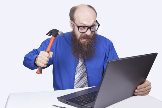 Angery businessman and hammer  - (Series)