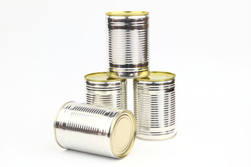 Unopened cans arranged on the white background