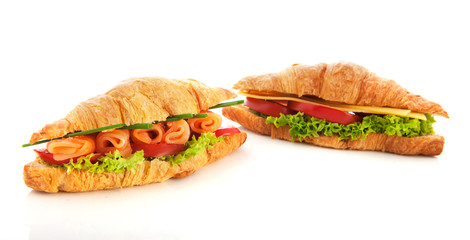 Croissants with cheese, salmon and vegetables