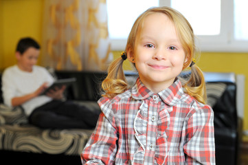 Smiling little girl in room