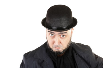 Suspicious man with beard and bowler hat
