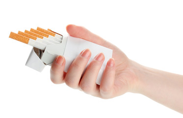 Woman hand with box of cigarettes, isolated on a white