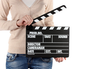 Movie production clapper board in hands isolated on white