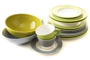Empty bowls, plates and cups isolated on white