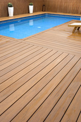 BLUE SWIMMING POOL WITH WOOD FLOORING-PISCINA MADERA