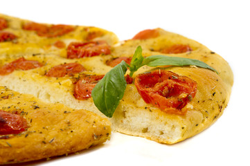 homemade focaccia with tomatoes and oregano