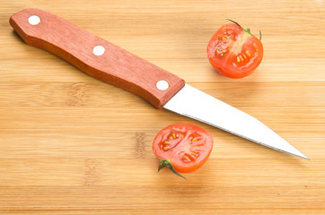 kitchen knife and tomato