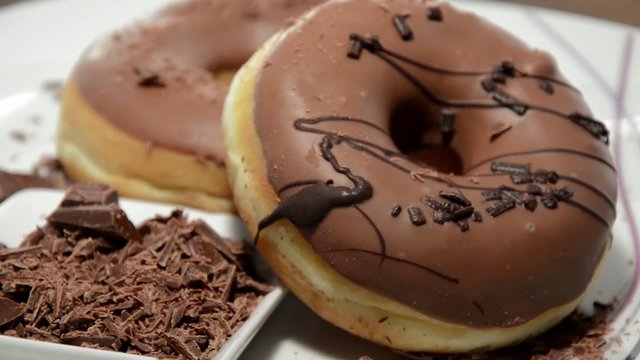 Chocolate Dounuts turning around (loopable HD video)