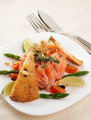 Salmon carpaccio on restaurant table