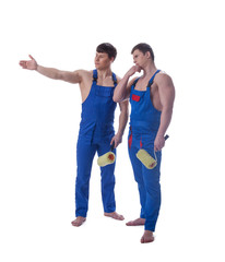 Fototapeta premium Two handsome painters in blue overalls