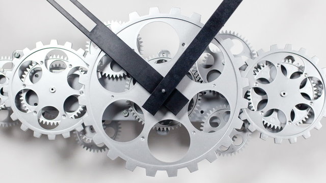 stop motion of a clock face with cogs and dials