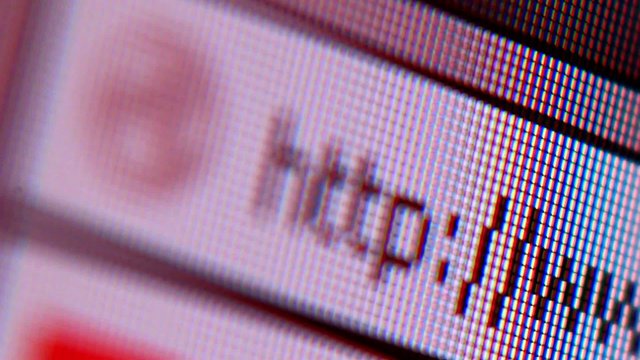 Rack focus on macro of letters on screen.