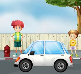 Fototapeten Ein Junge und ein Kind auf der Straße mit einem Auto © GraphicsRF