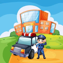 Fototapeten Ein Streifenwagen und der Polizist in der Nähe der Schule © GraphicsRF