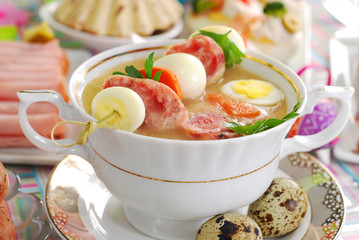 easter white borscht with quail eggs and sausage in a glass