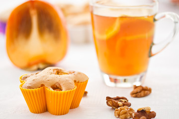 muffins with slices of persimmon