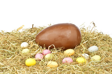 Chocolate egg in straw