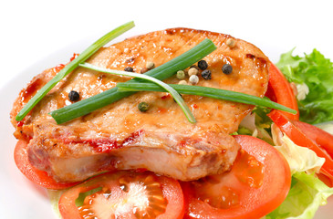 Spicy pork cutlet with fresh vegetables