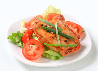Spicy pork cutlet with fresh vegetables